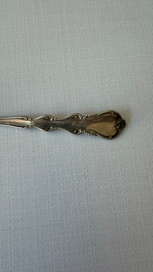 Strained serving spoon