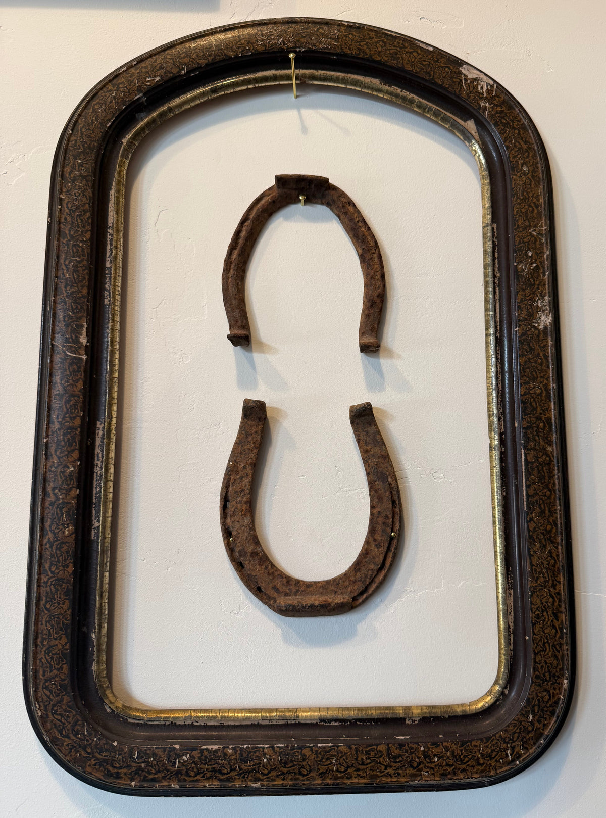 Antique Framed Wrought Iron Horseshoes