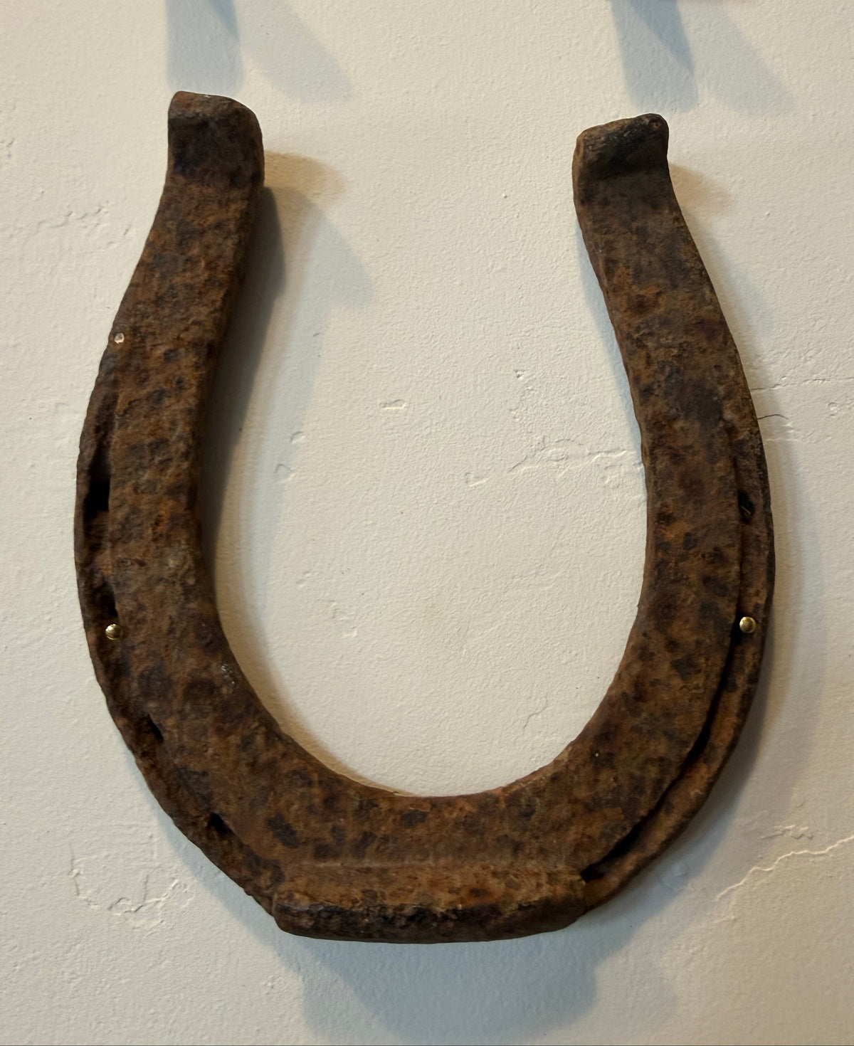 Antique Framed Wrought Iron Horseshoes