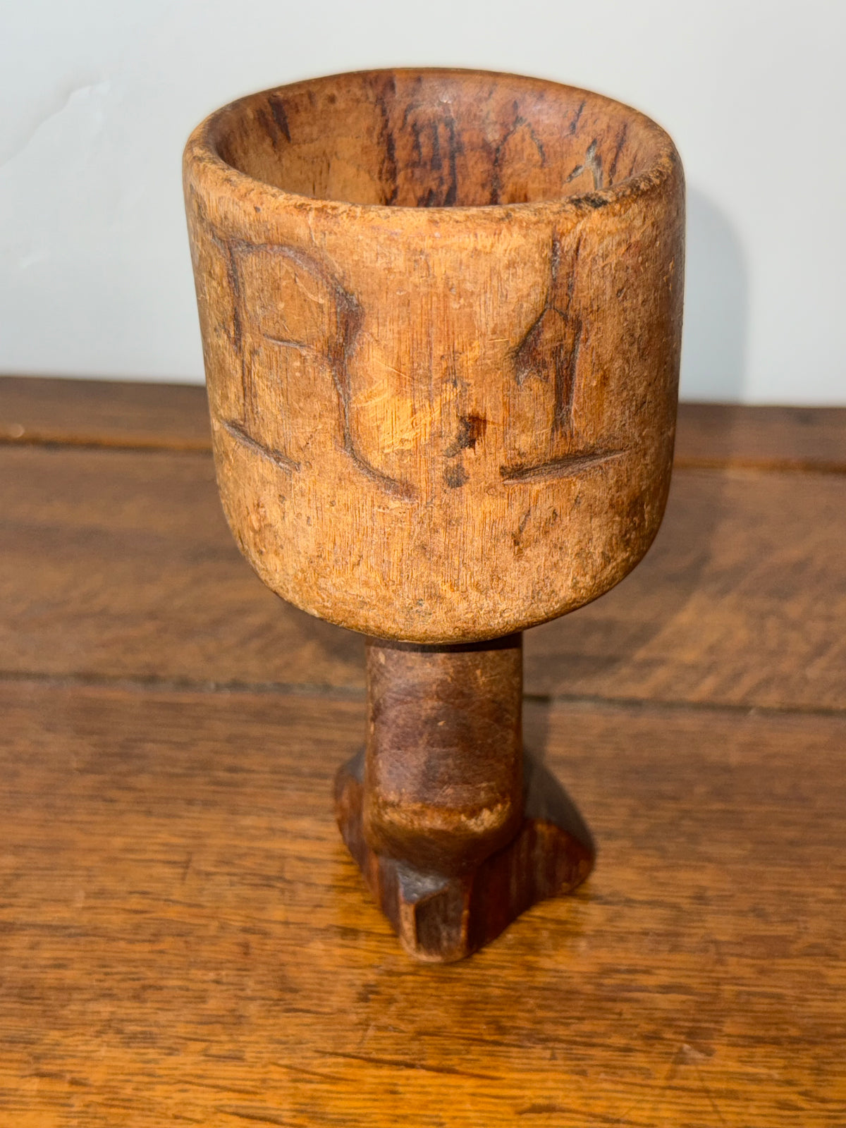 Hand-Carved Primitive Wooden Chalice in Ornate Gesso Frame